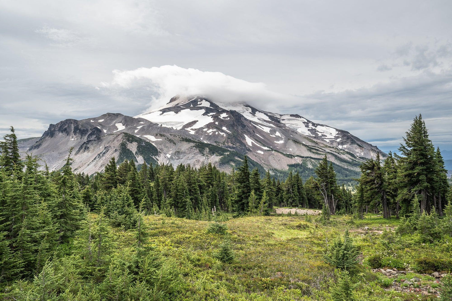 Fine Pacific Crest Trail photography print of a snow-covered mountain towering over the landscape.