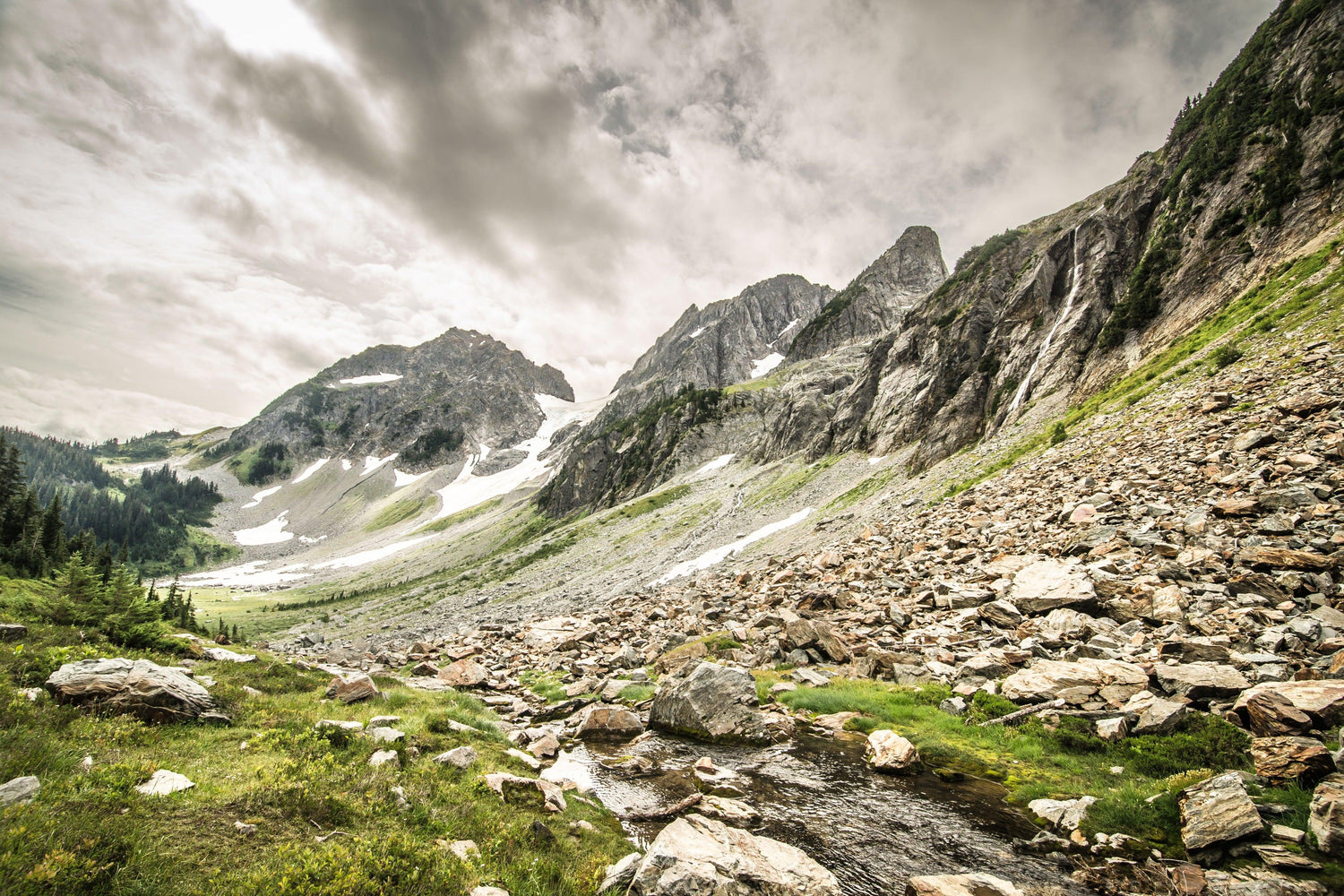 Fine North Cascades National Park photography print of the carving creek that runs along the towering peaks toward the Pelton Basin.