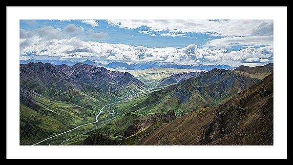 Framed fine print of an explosive array of colors layering the landscape of Denali National Park in Alaska.