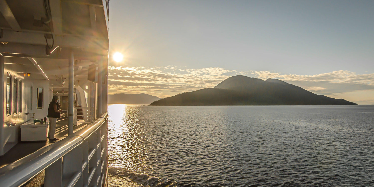 Fine photographic print of the Alaska Marine Highway M/V Kennecott setting sail through the Alaskan Inside Passage.