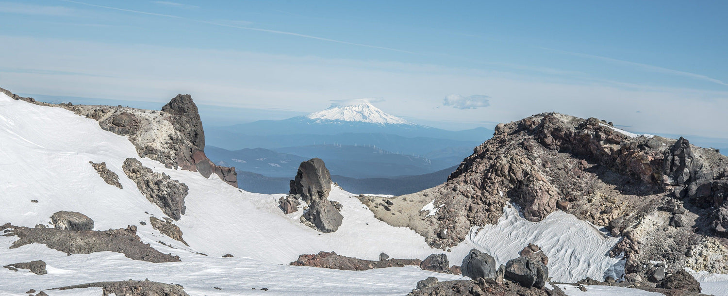 Fine Lassen Volcanic National Park photography print of a view from Mount Shasta from the top of snowy Lassen Peak.