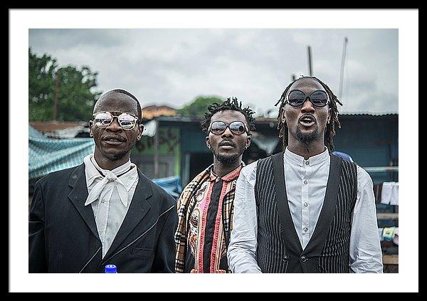 Framed fine sapeur photography print of three fashionable Sapeur men dressed up and strutting their clothes in Kinshasa, Democratic Republic of the Congo.