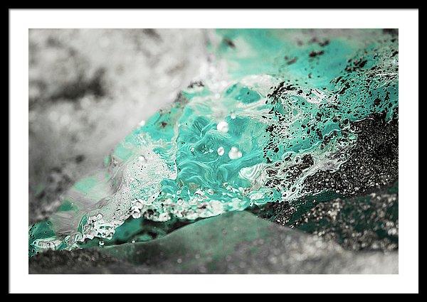 Framed fine photographic and art print of bright blue water melting off a glacier in Wrangell St Elias National Park in Alaska.