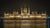 Fine photographic and art print of the Hungarian Parliament building in Budapest at nighttime with the light reflecting on the Danube River.