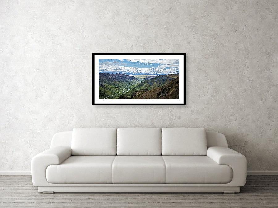 Framed fine print and wall art of an explosive array of colors layering the landscape of Denali National Park in Alaska.