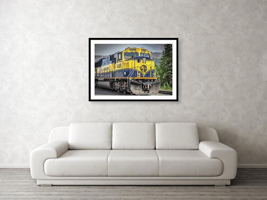 Framed fine photographic and wall art print of the Alaskan Gold Star Railroad train engine pulling into Denali National Park.