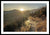 Framed fine photographic and art print of a sunrise highlighting the desert trail of the Pacific Crest Trail with mountains in the background.