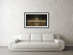 Framed fine photographic and wall art print of the Hungarian Parliament building in Budapest at nighttime with the light reflecting on the Danube River.