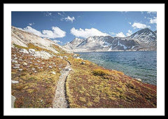 Framed fine photographic print of the Pacific Crest Trail meandering along a cold alpine lake in the High Sierra Mountain Range.