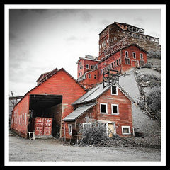Framed fine photographic and art print of the towering red buildings of the Kennecott Mine in Wrangell St Elias National Park in Alaska.