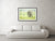 Framed fine photographic and wall art print of a wild elephant grazing the Ngorongoro Crater in Tanzania as a pack of zebra run orderly in the other direction.