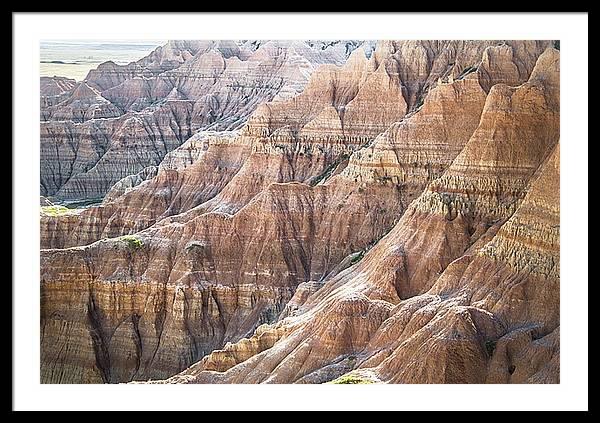 Framed fine photographic print of the painted ripples of the Badlands National Park landscape in South Dakota.
