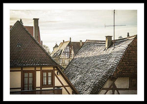 Framed fine photographic and art print of the morning sunlit rooftops of the Bavarian and historical town of Rothenburg ob der Tauber in Germany.