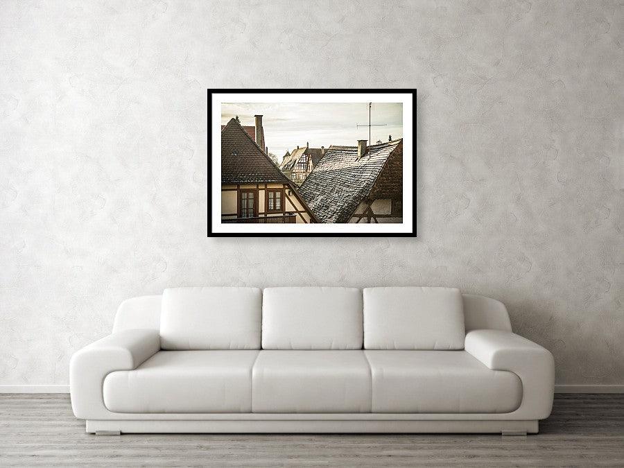 Framed fine photographic and wall art print of the morning sunlit rooftops of the Bavarian and historical town of Rothenburg ob der Tauber in Germany.