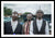 Framed fine sapeur photography print of three fashionable Sapeur men dressed up and strutting their clothes in Kinshasa, Democratic Republic of the Congo.