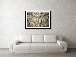 Framed fine photography print and wall art of a close up of the scorched and cracked Namib Desert floor in Namibia's Sossusvlei area.