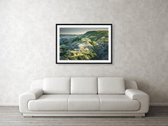 Framed fine photographic and wall art print of a sun-soaked butte in Theodore Roosevelt National Park in North Dakota.