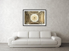 Framed fine photography print and wall art of the well-illuminated and ornately carved decorated dome of the Theatine Church in Munich Germany.