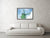 Framed fine photographic and wall art print of a single green windmill against a backdrop of blue dutch skies.