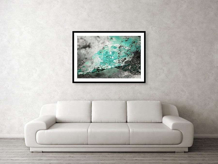 Framed fine photographic and wall art print of bright blue water melting off a glacier in Wrangell St Elias National Park in Alaska.